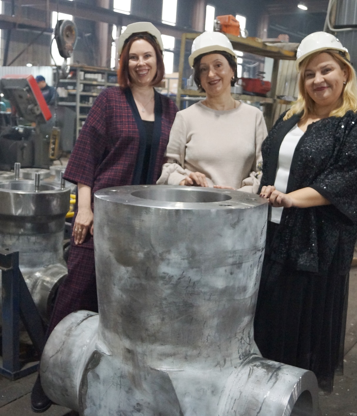 АМК employees in the production workshop